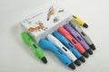 3D print pen with hot melt extrusion nozzle and silver body on white background
