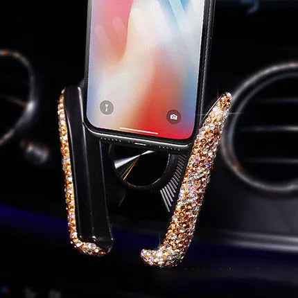 Car buckle mobile phone holder in ABS plastic on a car dashboard with a smartphone in place