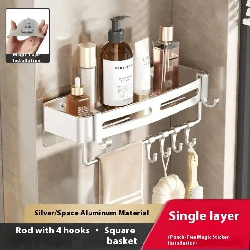 Gun Gray metal corner storage rack mounted on a bathroom wall, holding toiletries.