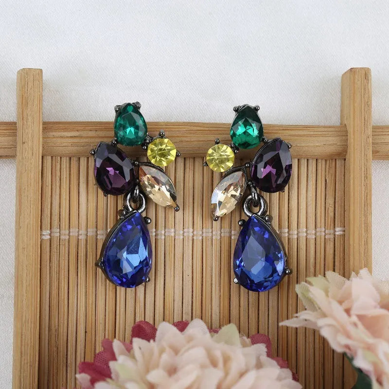 Glass crystal drop earrings in green with steel needle post, simple style design
