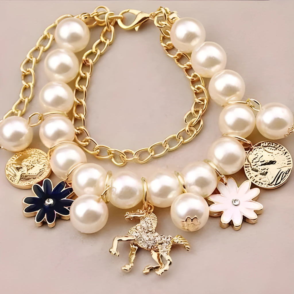 White pearl flower bracelet with simulated pearl beads, floral design, 17cm length, on a soft surface