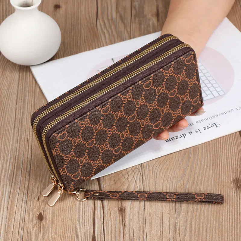 Retro-style long PU leather wallet clutch with printed design showing mobile phone compartment and zipper closure