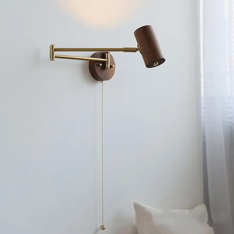 Retro wooden finish wall lamp with long rotating arm and integrated switch.