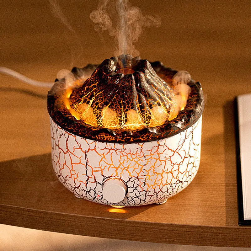 Column-shaped volcano humidifier diffuser emitting mist with red and orange LED flame effect