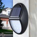 Black LED solar wall light with solar panel and automatic light sensor