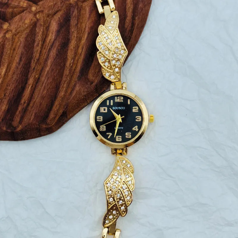 Stainless steel women's watch with round dial showing gold face colour option and vachette clasp buckle