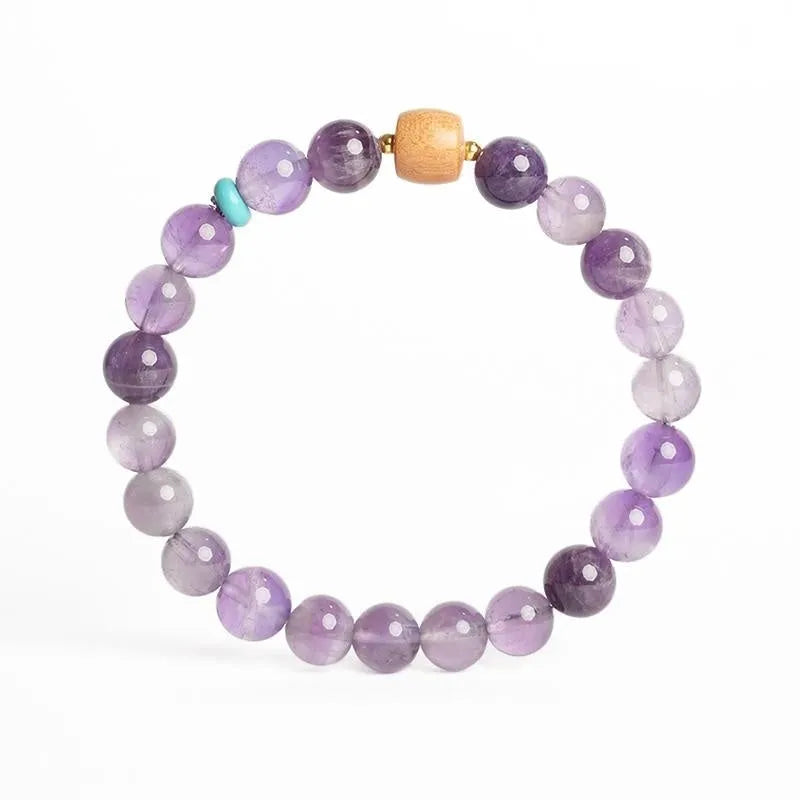 Handmade purple amethyst crystal bracelet for women showing 6mm and 8mm bead size options
