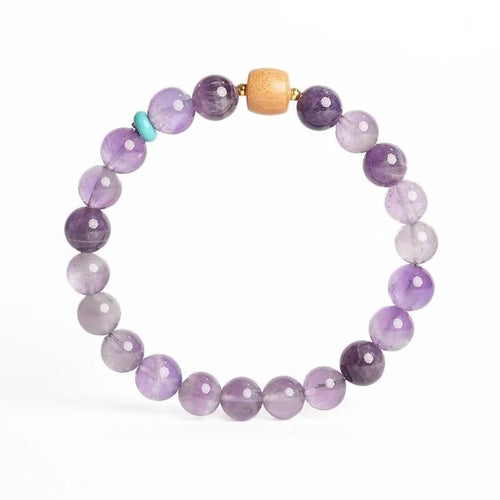 Handmade purple amethyst crystal bracelet for women showing 6mm and 8mm bead size options