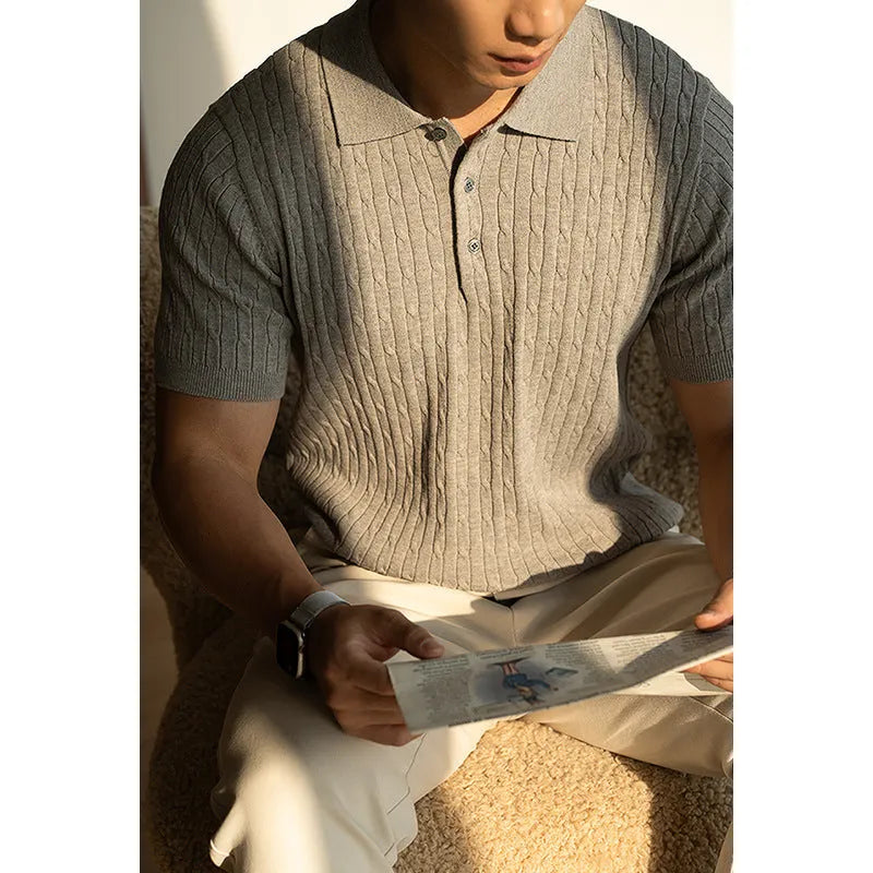 Men's khaki short-sleeve versatile top on a hanger, showing business casual style.