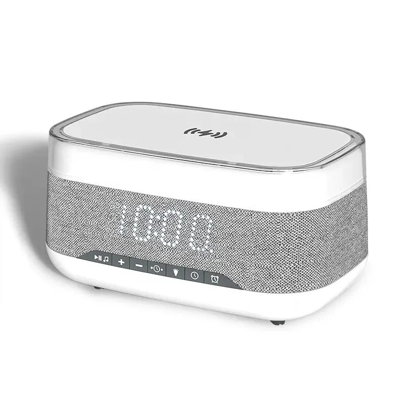 White multifunctional alarm clock with Bluetooth speaker, wireless charging pad, and night light.