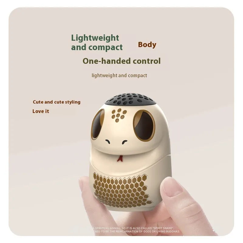 TK900 White cartoon-design Bluetooth speaker with waterproof construction and lighting effects