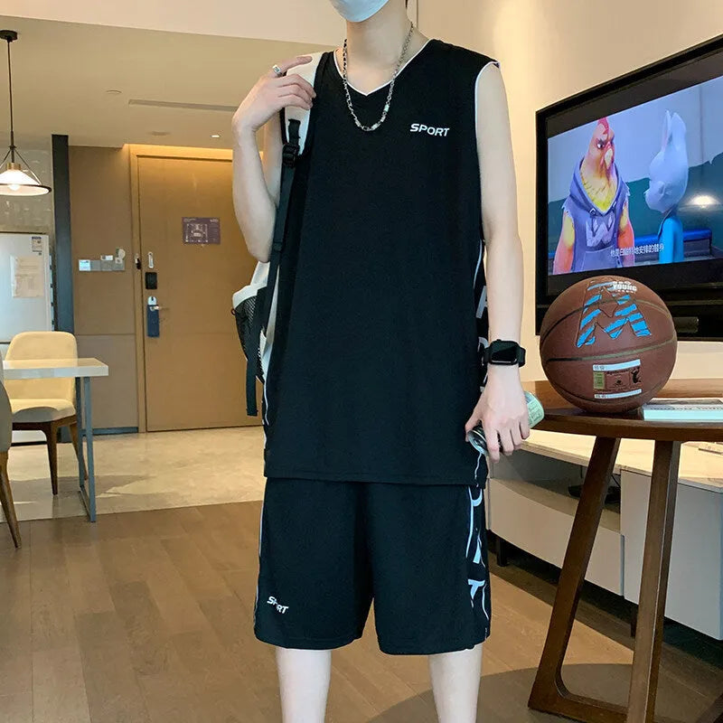 Light grey polyester basketball vest and shorts sports suit laid flat