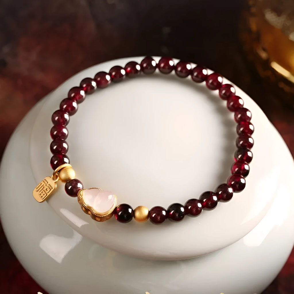 Chinese-style gourd bracelet with imitation garnet beads and Fu character symbols on U-shaped electroplated setting