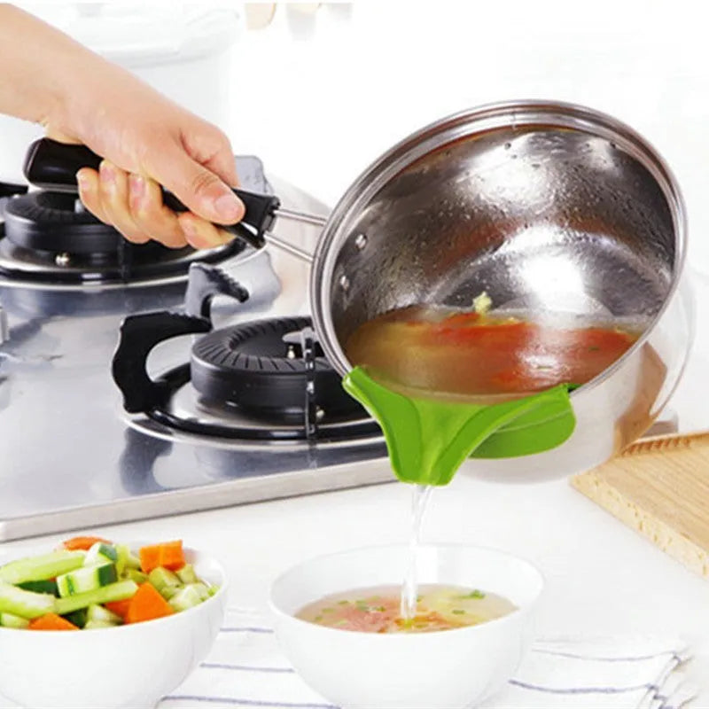 Green silicone kitchen funnel with clip for secure attachment to round pots