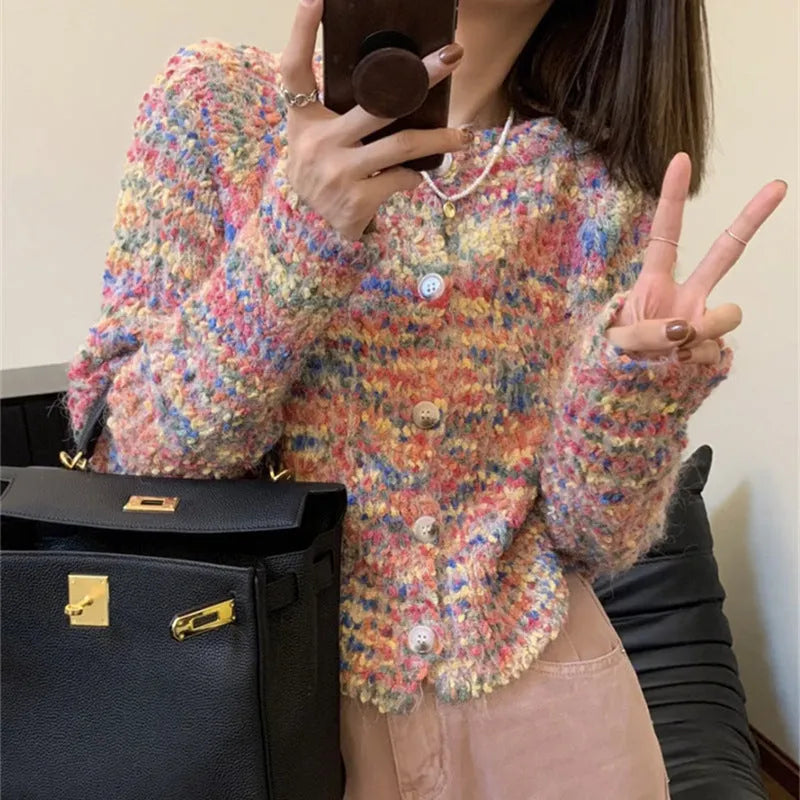 A retro-style slim fit knitted cardigan in a soft pink or green colour with a textured toothbrush hair fabric.