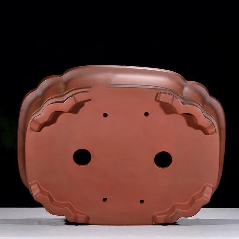 Large antique finish purple clay rectangular flowerpot with carved Chinese tree stump, pine, cypress, and fruit designs.