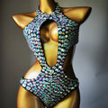 Women's one-piece swimsuit with black mesh diamond pattern on nylon fabric.