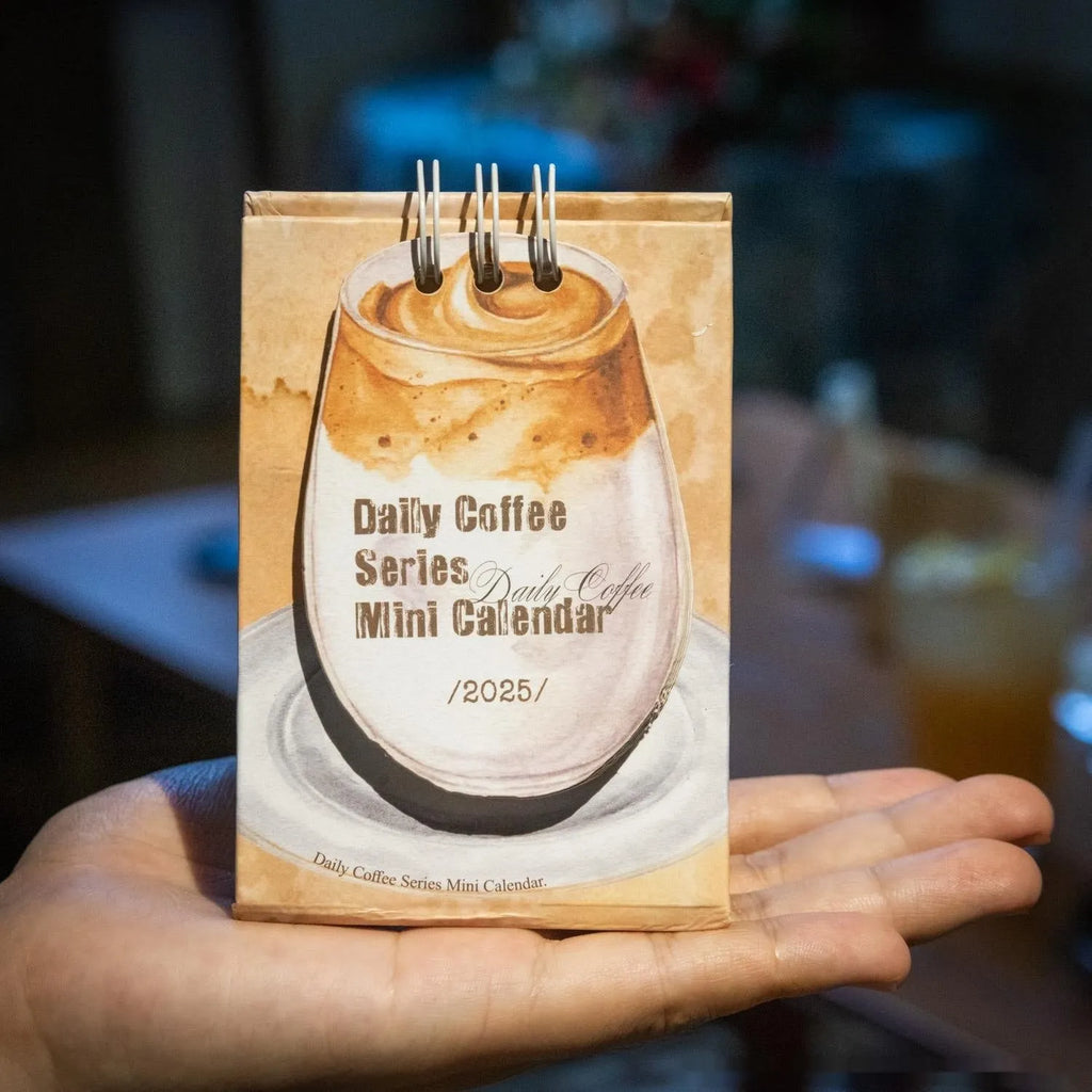 Mini desk calendar 2025 with four themed paper designs including coffee time model