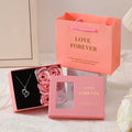 Six red soap roses in a black gift box with a matching handbag, a Korean style Valentine's gift set.