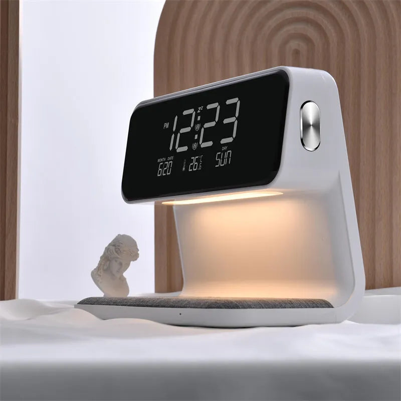 White bedside lamp with integrated wireless charging pad and LCD alarm clock display