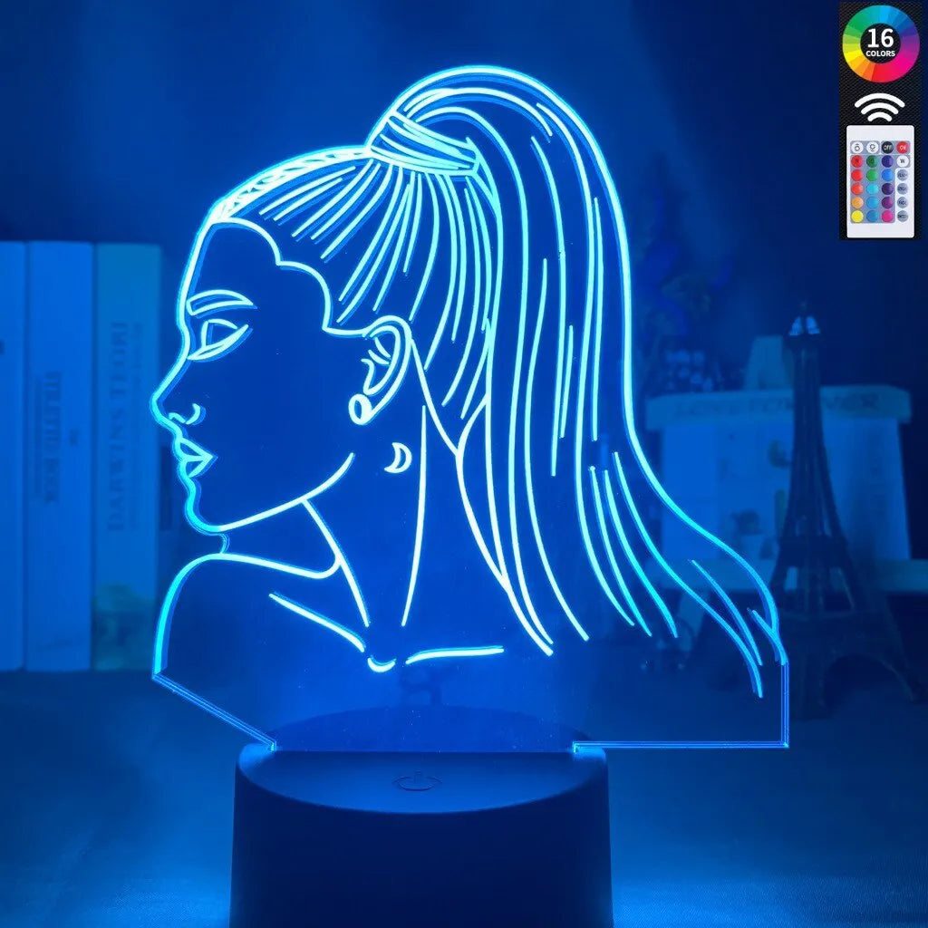 Slim European style acrylic 3D LED night light with colourful illumination on a black base.