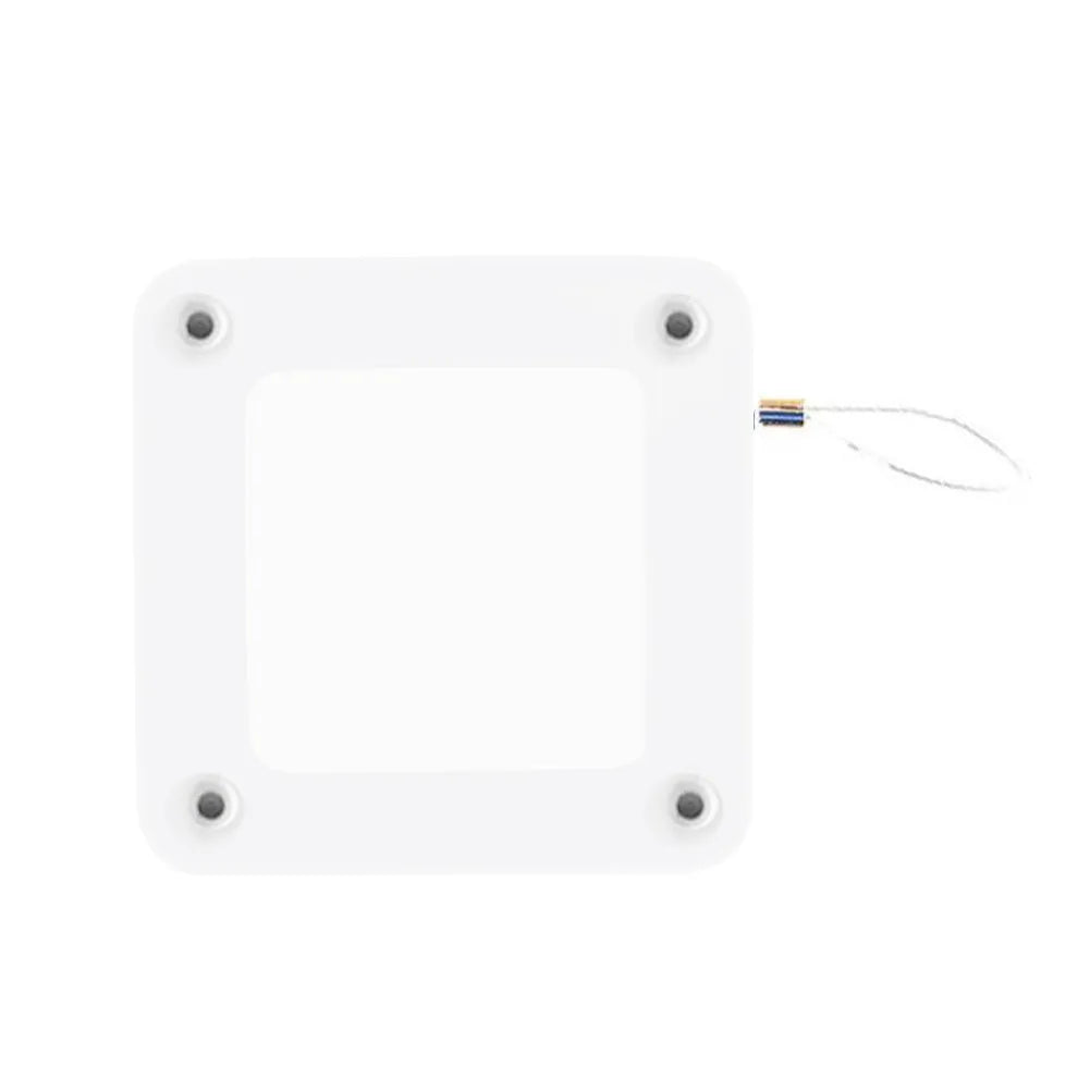 White automatic door closer with adhesive mount and tension adjuster for no-drill installation on doors.