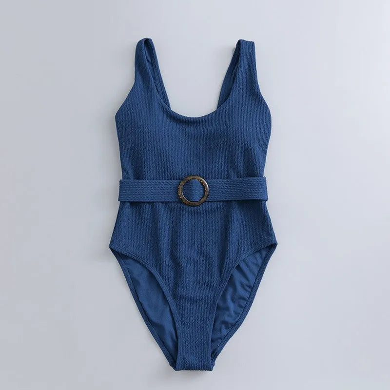 Navy blue women's slim-fitting one-piece triangle swimsuit on a mannequin.