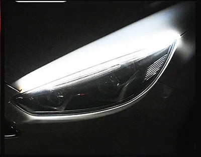 Car LED daytime running light strip with silicone body and coloured flowing turn signal effects