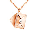 Titanium steel envelope lover letter pendant necklace on display with gold finish and adjustable chain