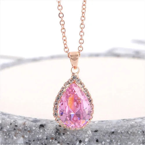 Women's rose gold geometric drop necklace with rhinestone inlay in pink colour