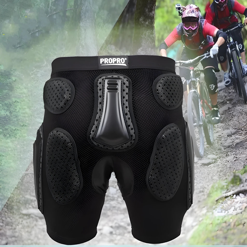 Black cycling hip protection pants with integrated pads, showing hook and loop fastener closures.