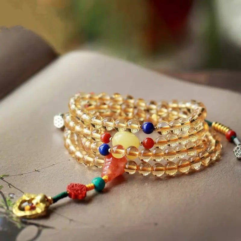 Brazilian natural citrine bracelet with yellow and red body colour, 1mm bead diameter