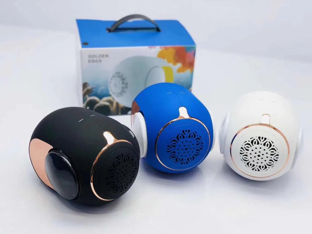 Small golden egg-shaped portable Bluetooth speaker in black, white, or blue colour.