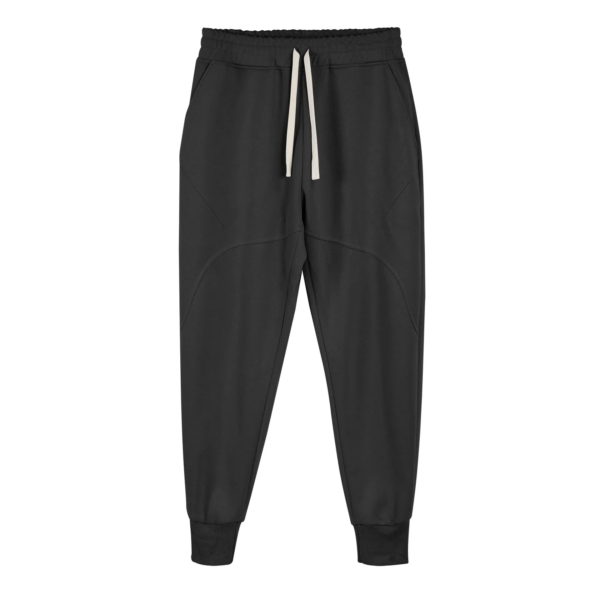 Man wearing grey ankle-tie drawstring sweatpants for casual leisure.