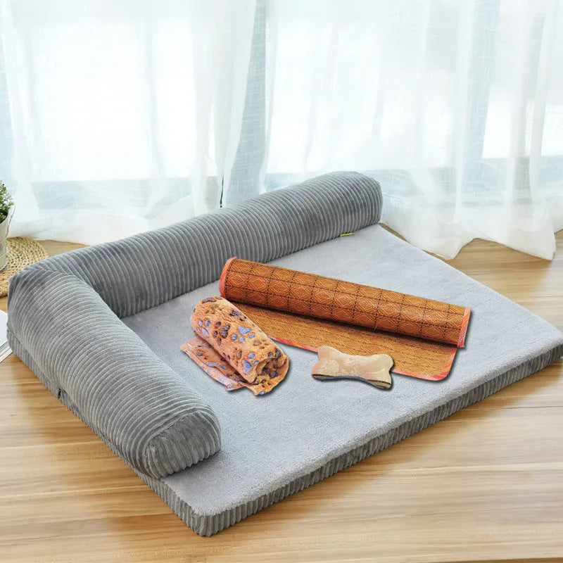 Corduroy pet dog sofa with bolster sides on a non-slip cloth base, shown in grey colour.
