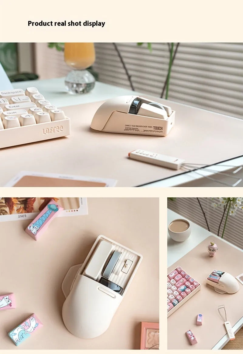 Tofu-coloured three-mode wireless mouse with ergonomic design on a desk.