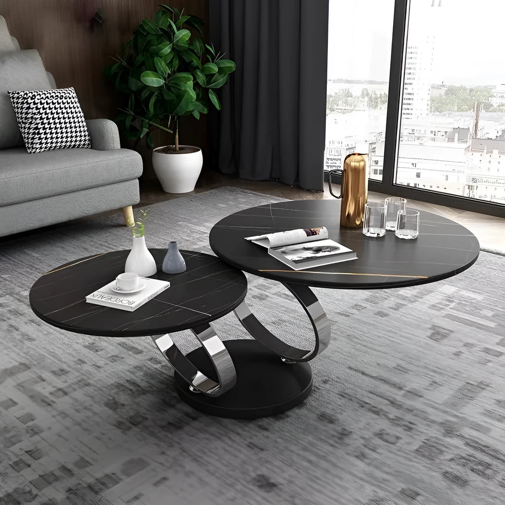 Round rotary folding table with slate top in black and white, set in a living room