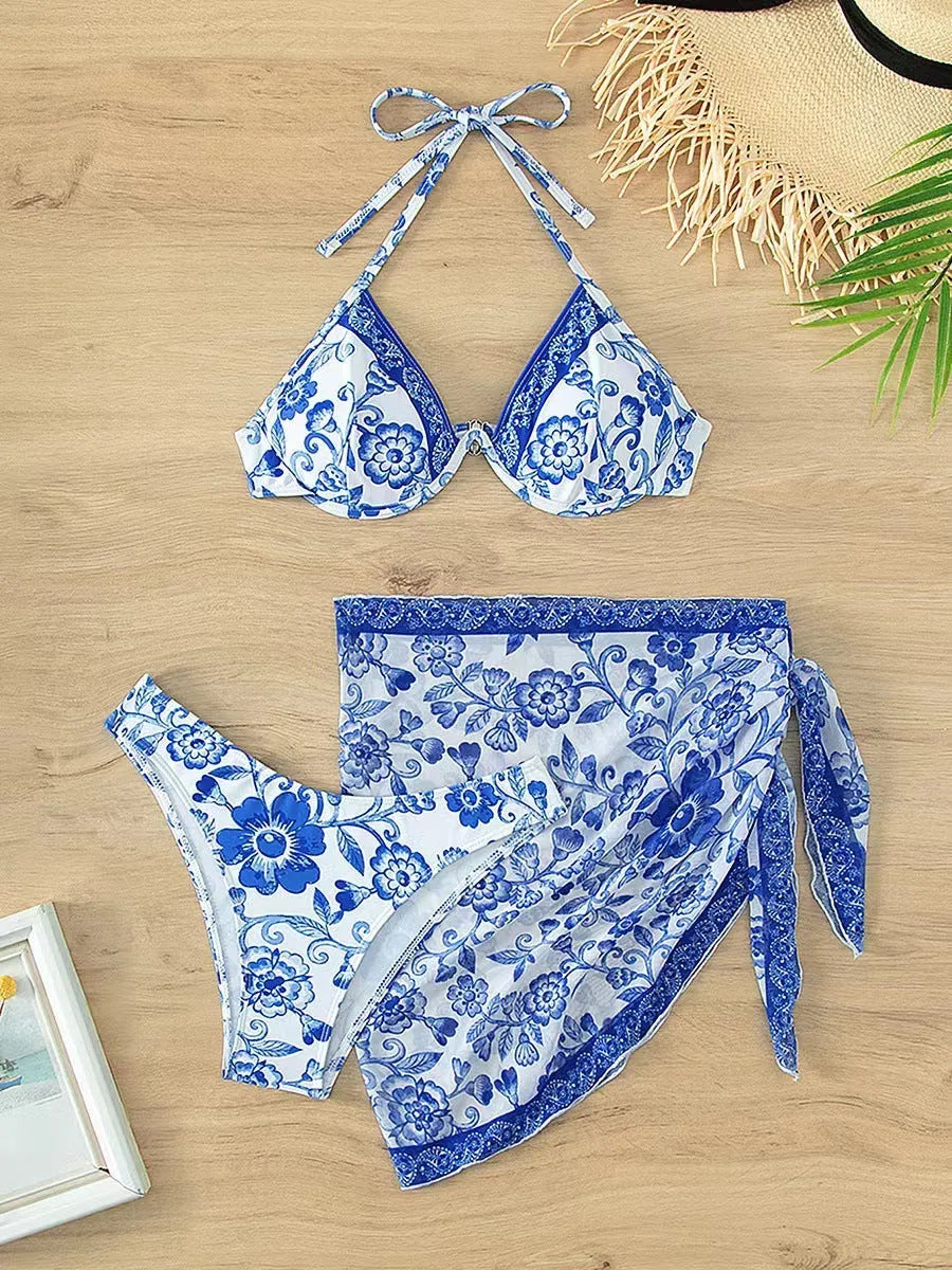 Blue and white porcelain printed three-piece bikini set with striped pattern and adjustable lace-up detail, sizes S to XL.