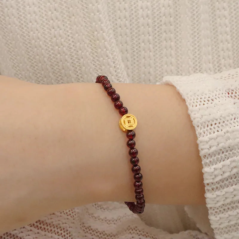 Chinese-style gourd bracelet with imitation garnet beads and Fu character symbols on U-shaped electroplated setting