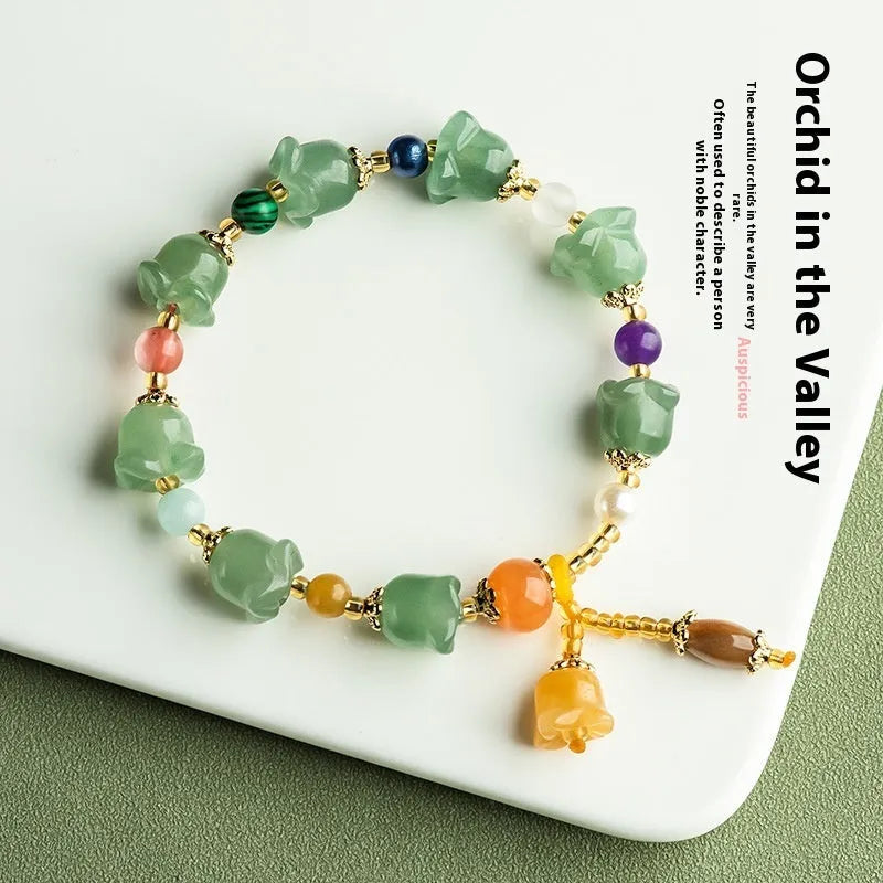 Natural Xinjiang Jinsi Jade bracelet with carved orchid beads in aventurine orchid colour for 14-18cm wrists