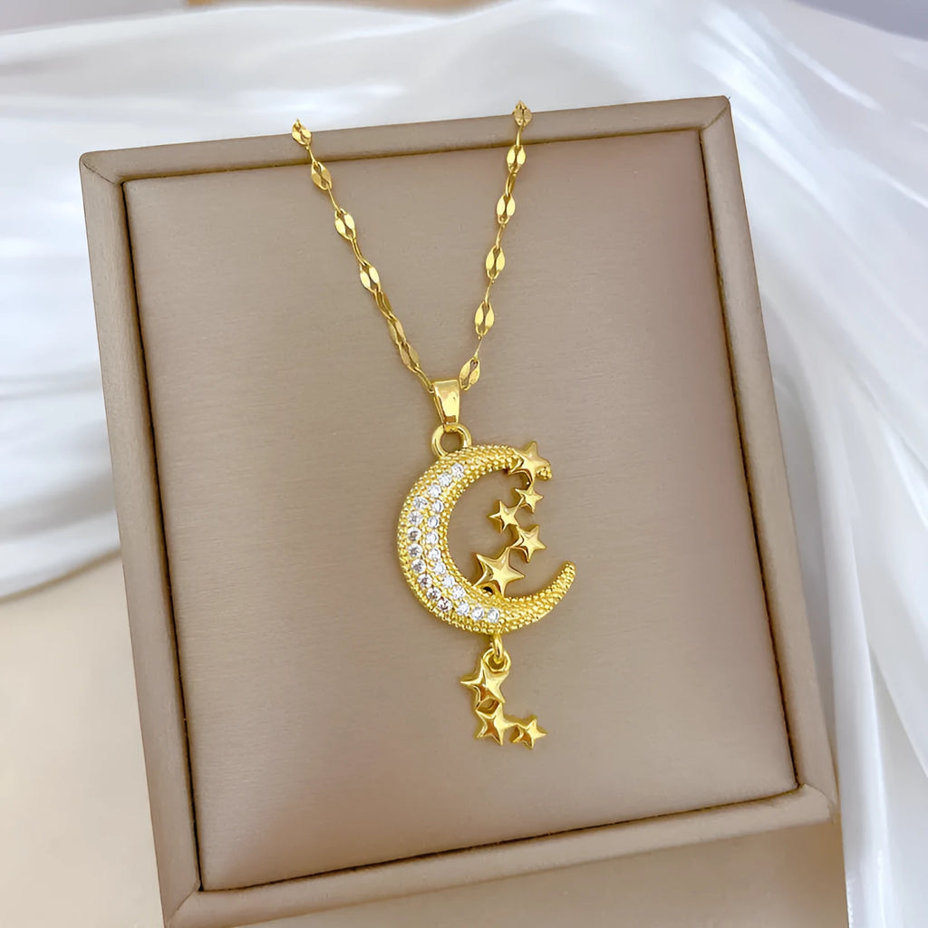Moon Tassel Necklace with diamond-set copper pendant on a stainless steel chain.