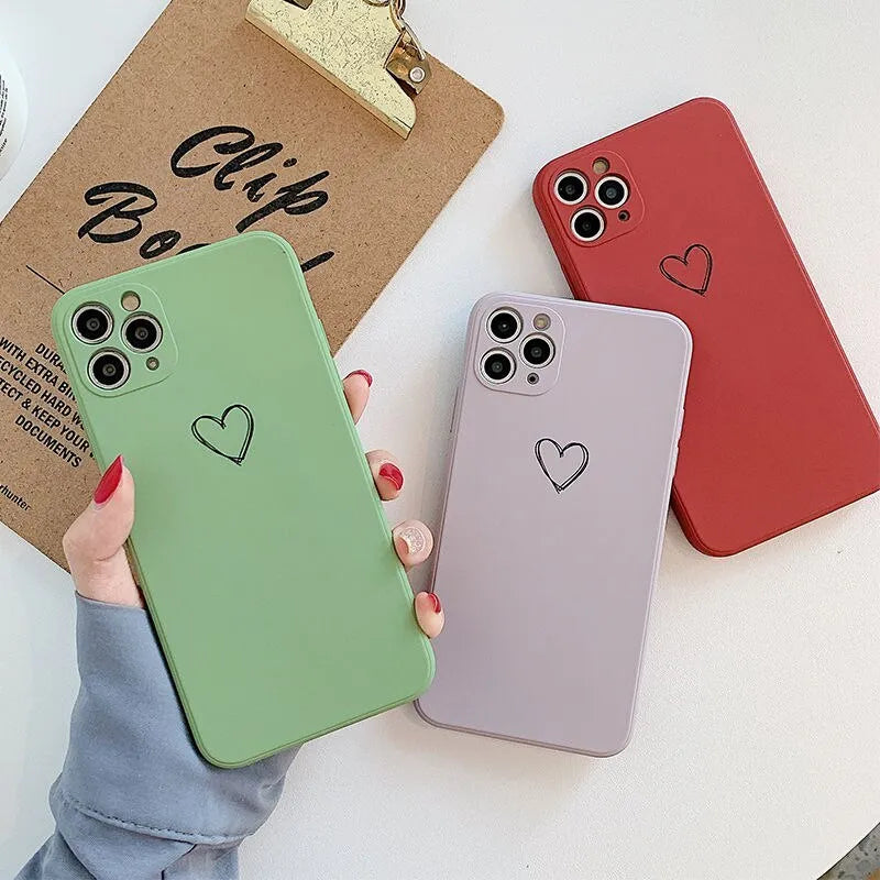 Silicone TPU phone case for Apple iPhone in various solid colours on a white background.