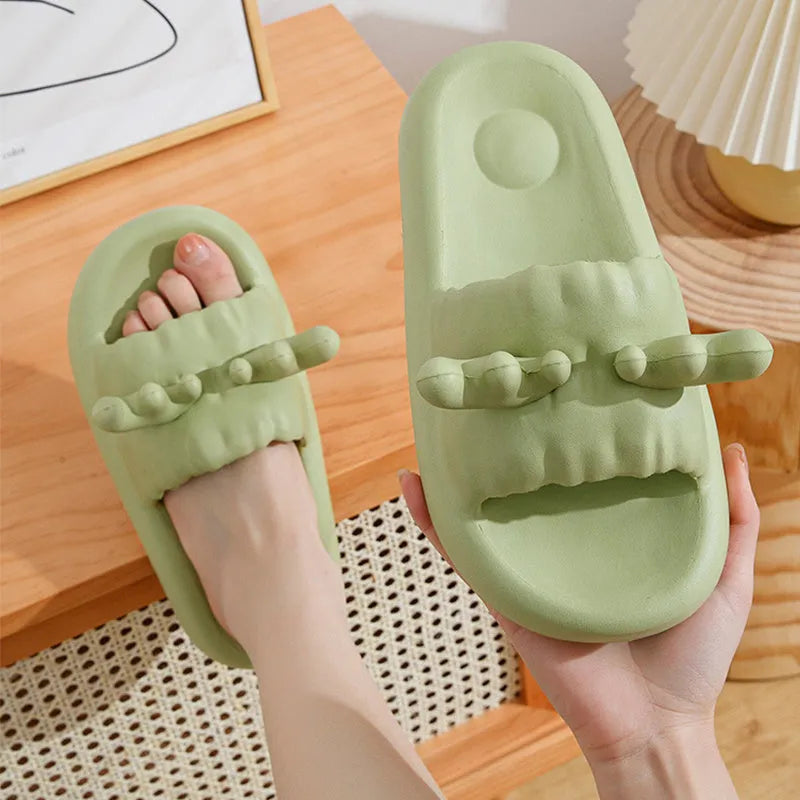 Women's hollow-out flip-flop slippers in light yellow with a textured non-slip EVA sole.