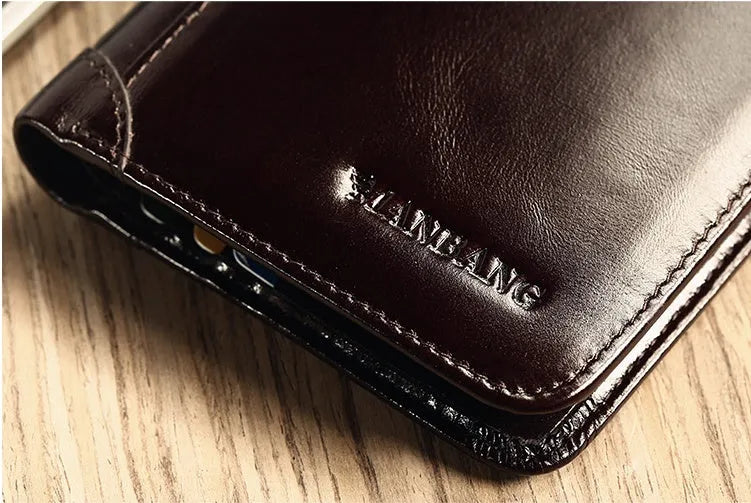 Men's black full-grain leather bifold wallet showing open interior with card slots and an exterior zippered coin pouch.