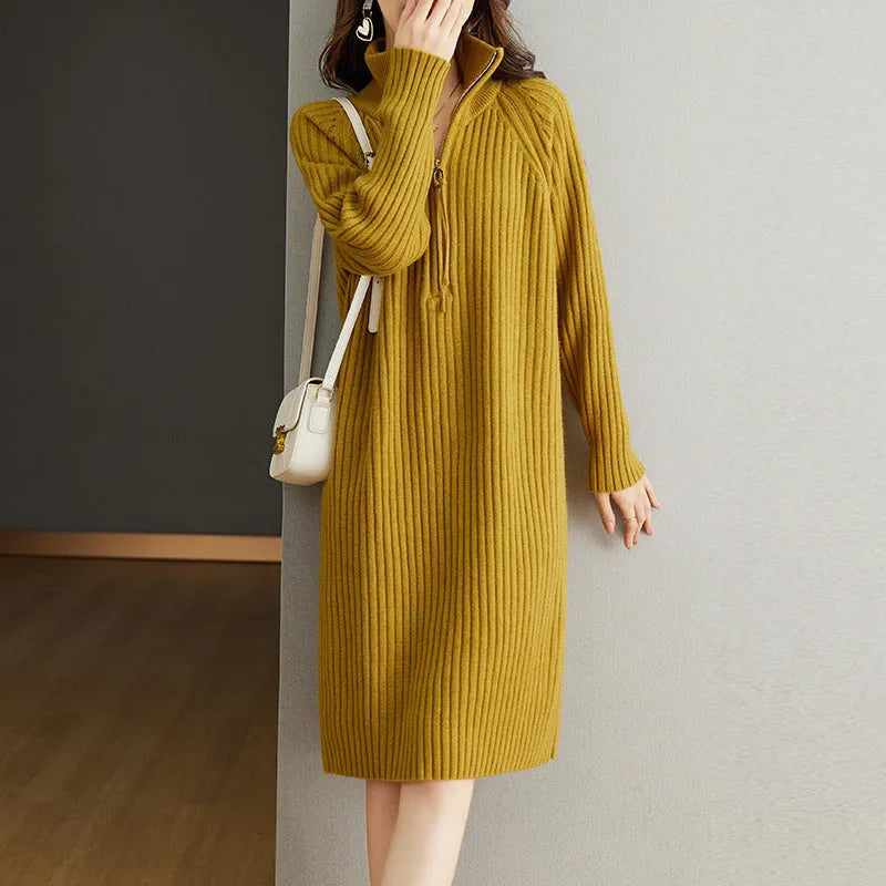 Beige half-zip woollen midi dress with long sleeves and a stand collar, laid flat.