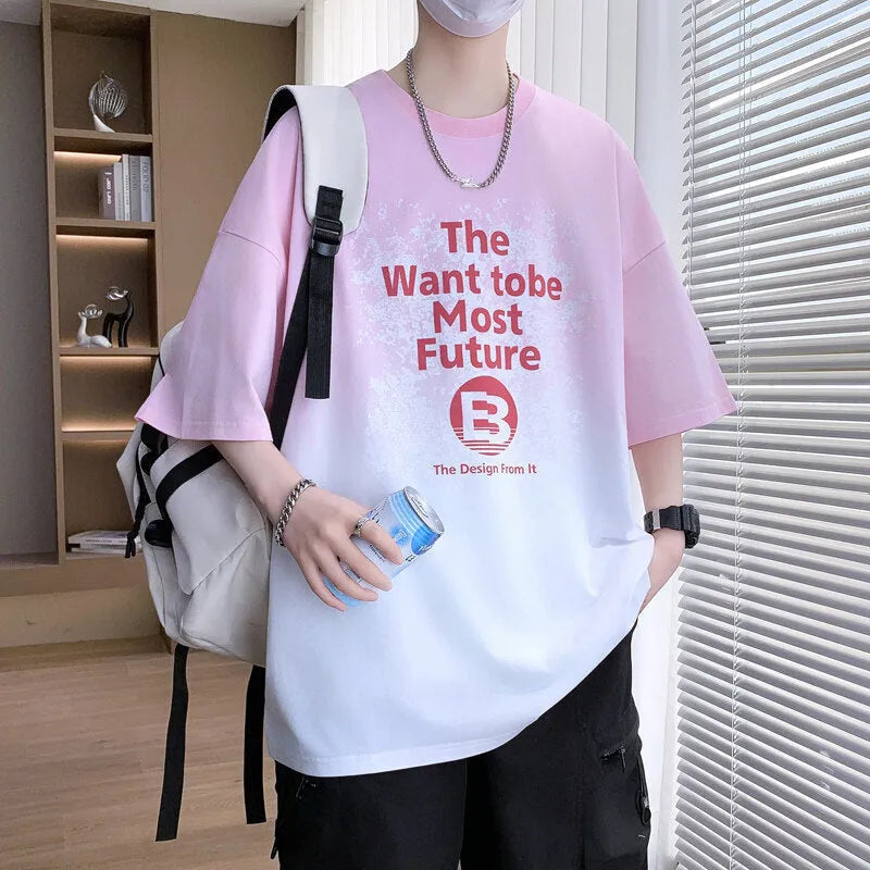 Boy wearing a dark blue youth T-shirt with a printed text pattern and drop-shoulder sleeves