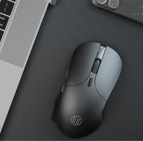 Black wireless voice mouse with six buttons showing compact dimensions of 123mm x 35mm x 65.5mm