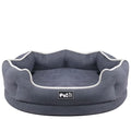 Blue memory foam pet cushion on floor with dog sitting on it, size L option shown