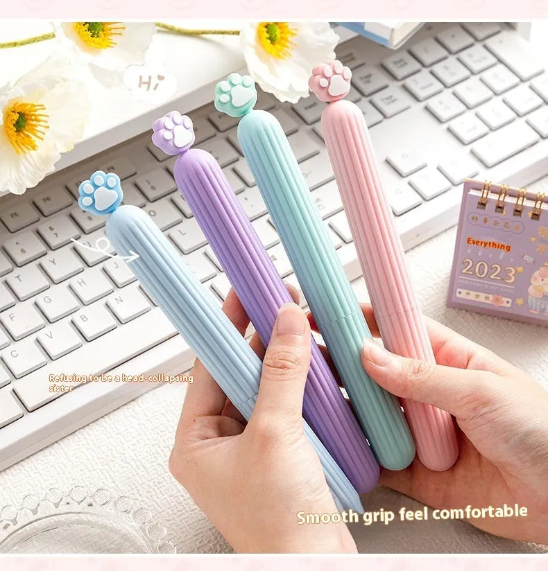 Small cat's paw cartoon pen comb, 18.3cm by 2cm, TPR and PP, random colour