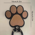 Wooden paw print coat hook in black colour with wall mounting hardware